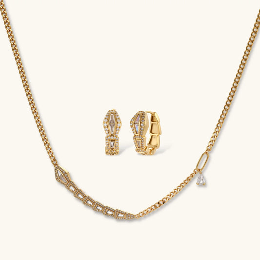Gold-plated necklace with geometric diamond segments and matching huggie earrings featuring cubic zirconia details