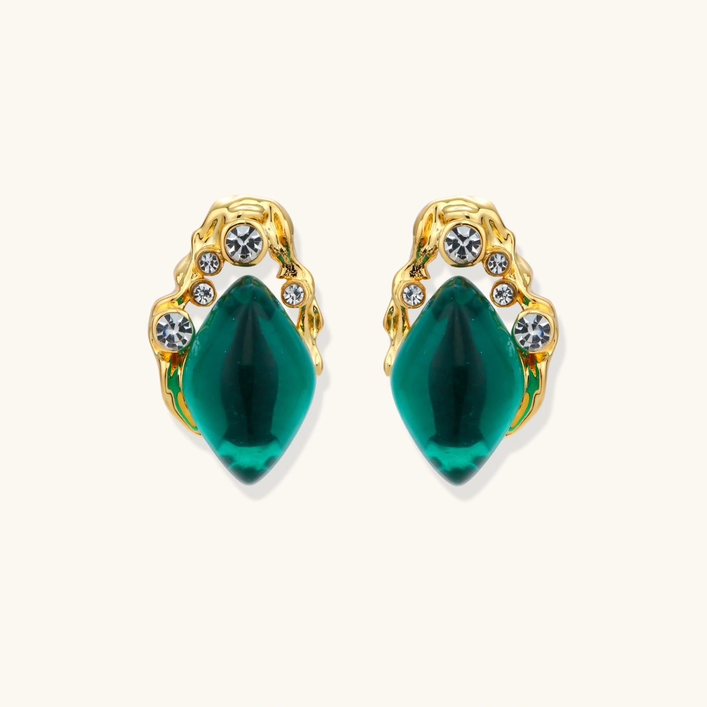 Gold-plated stud earrings featuring teardrop emerald green liuli stones with cubic zirconia crystal accents on white background.